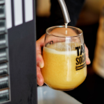 tap social movement beer pouring